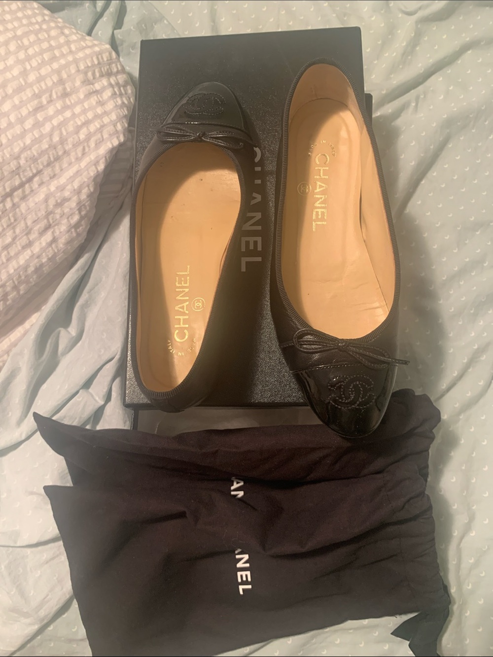 CHANEL Black Leather Cap-Toe CC Ballet Flats
